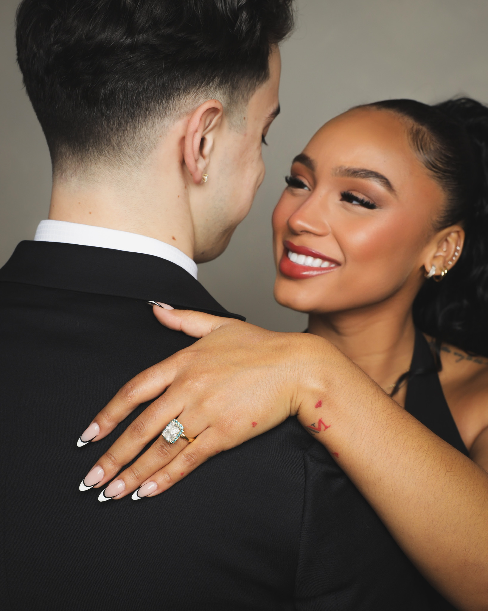 Shadean smiling with Anthony during their engagement session